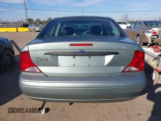 2004 Ford Focus SE with VIN 1FAFP34Z94W157468, listed as a IAAI auction lot 41311417 with Not Provided miles and . Bid and sale history available at DreamBid. Image 16.