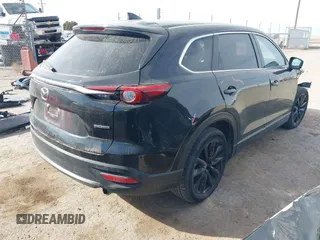 2023 Mazda CX-9 Touring Plus with VIN JM3TCBAY9P0649348, listed as a IAAI auction lot 41519499 with 23,749 mi miles and . Bid and sale history available at DreamBid. Image 4.