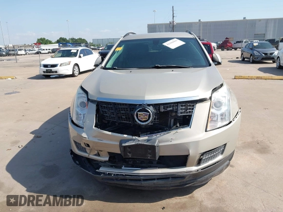 2015 Cadillac SRX z VIN 3GYFNAE37FS597695, wystawiony jako IAAI lot #42184666 z przebiegiem 106 210 mil mil oraz . Historia ofert i sprzedaży dostępna na DreamBid. Obrazek 12.