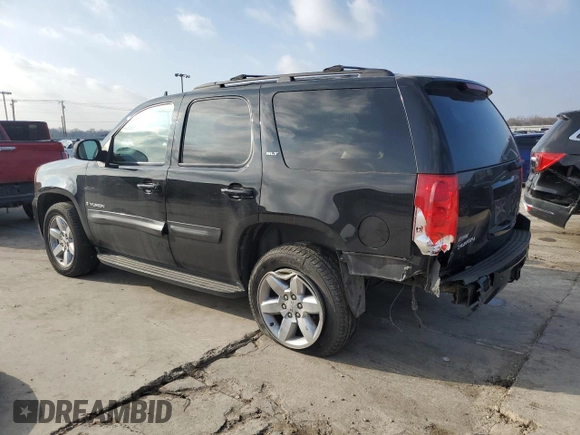 2009 GMC Yukon SLT w/4SB with VIN 1GKFC33099J117831, listed as a Copart auction lot 44417365 with 197,485 mi miles and Salvage Title. Bid and sale history available at carsss.com. Image 2.