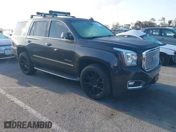 2015 GMC Yukon Denali z VIN 1GKS1CKJ7FR566419, wystawiony jako IAAI lot #41948825 z przebiegiem 235 037 mil mil oraz . Historia ofert i sprzedaży dostępna na DreamBid. Obrazek 1.