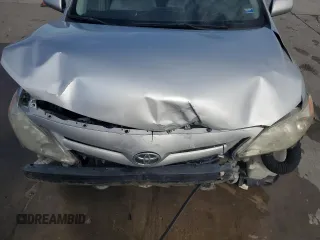 2011 Toyota Corolla L with VIN JTDBU4EEXBJ090831, listed as a Copart auction lot 42156935 with 144,697 mi miles and Salvage Title. Bid and sale history available at carsss.com. Image 11.