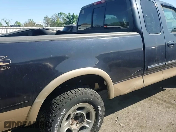 2000 Ford F-150 XL с VIN 1FTRX18L1YNA53246, выставлен на аукционе Copart как лот 56052295 с пробегом Не указан миль и Списание • Salvage title. История ставок и продаж доступна на DreamBid. Изображение 13.
