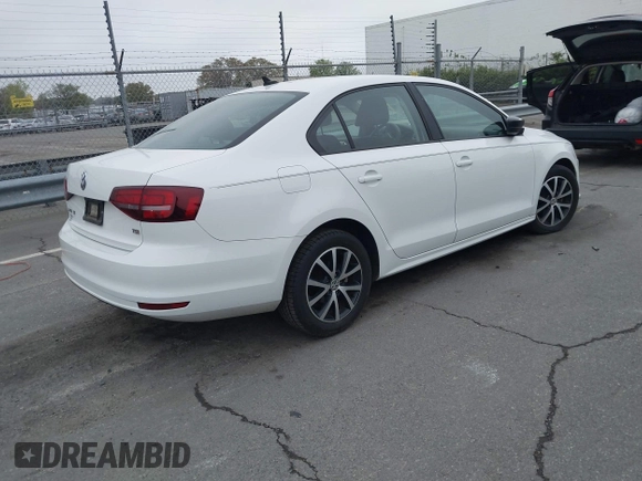 2016 Volkswagen Jetta Sedan 1.4T SE with VIN 3VWD67AJ6GM260584, listed as a IAAI auction lot 41903048 with 104,876 mi miles. Bid and sale history available at carsss.com. Image 4.