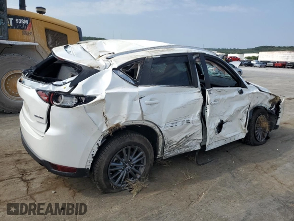 2021 Mazda CX-5 Touring with VIN JM3KFACM1M0405129, listed as a Copart auction lot 67874724 with 49,618 mi miles and Salvage Title. Bid and sale history available at carsss.com. Image 3.