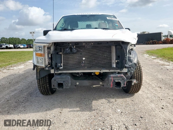 2022 Ford F-150 XL with VIN 1FTMF1C56NKD24644, listed as a Copart auction lot 63307315 with 64,704 mi miles and Salvage title. Bid and sale history available at DreamBid. Image 5.