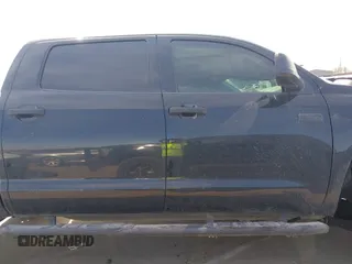 2018 Toyota Tundra SR5 z VIN 5TFDW5F12JX694518, wystawiony jako IAAI lot #41663831 z przebiegiem 183 220 mil mil oraz . Historia ofert i sprzedaży dostępna na DreamBid. Obrazek 14.