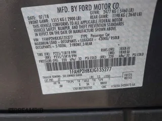 2018 Ford Taurus SEL with VIN 1FAHP2H8XJG135277, listed as a IAAI auction lot 42606524 with 27,103 mi miles and . Bid and sale history available at DreamBid. Image 9.
