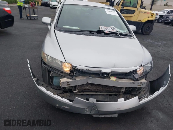 2011 Honda Civic LX with VIN 2HGFA1F54BH303802, listed as a IAAI auction lot 42195289 with 101,882 mi miles and . Bid and sale history available at DreamBid. Image 6.