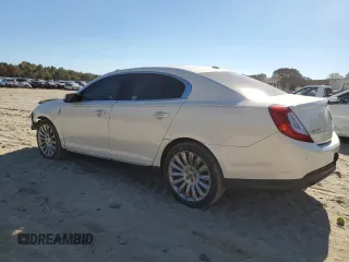 2013 Lincoln MKS z VIN 1LNHL9DK0DG605400, wystawiony jako Copart lot #77071034 z przebiegiem 73 450 mil mil oraz Szkoda całkowita • Salvage title. Historia ofert i sprzedaży dostępna na DreamBid. Obrazek 2.