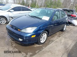 2004 Ford Focus ZX5 z VIN 3FAFP37334R120359, wystawiony jako IAAI lot #41922026 z przebiegiem 115 789 mil mil oraz . Historia ofert i sprzedaży dostępna na DreamBid. Obrazek 17.