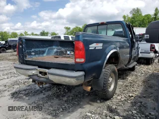 1999 Ford F-250 XL with VIN 1FTNF21FXXEB26561, listed as a Copart auction lot 54303275 with 219,108 mi miles and Salvage title. Bid and sale history available at DreamBid. Image 3.