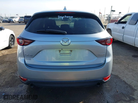 2020 Mazda CX-5 Touring with VIN JM3KFACM1L0789394, listed as a IAAI auction lot 41565887 with 73,730 mi miles. Bid and sale history available at carsss.com. Image 17.