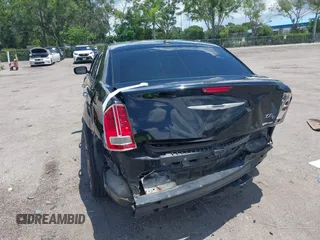 2014 Chrysler 300 C with VIN 2C3CCAKT9EH171614, listed as a IAAI auction lot 39747704 with 129,156 mi miles and . Bid and sale history available at carsss.com. Image 13.