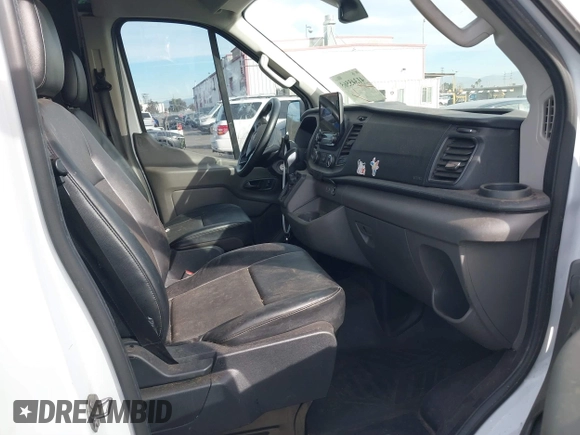 2021 Ford Transit Cargo with VIN 1FTBW3X82MKA19468, listed as a IAAI auction lot 41345565 with 67,485 mi miles. Bid and sale history available at carsss.com. Image 5.