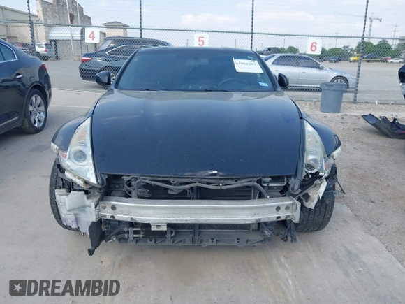 2015 Nissan 370Z z VIN JN1AZ4EH2FM442556, wystawiony jako IAAI lot #41956287 z przebiegiem 128 769 mil mil oraz . Historia ofert i sprzedaży dostępna na DreamBid. Obrazek 13.