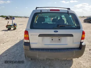 2007 Ford Escape XLS with VIN 1FMYU02Z87KB60530, listed as a Copart auction lot 61273345 with 57,574 mi miles and Salvage title. Bid and sale history available at DreamBid. Image 6.