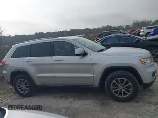 2012 Jeep Grand Cherokee Laredo with VIN 1C4RJFAG7CC189381, listed as a IAAI auction lot 41429085 with 137,238 mi miles. Bid and sale history available at carsss.com. Image 12.