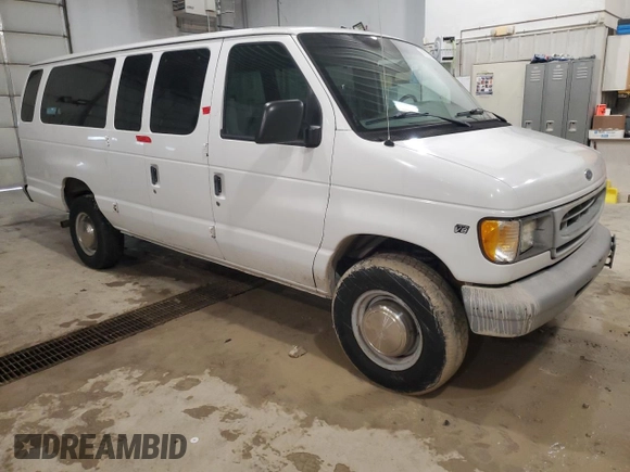 1999 Ford Econoline Passenger XL with VIN 1FBSS31L6XHA03014, listed as a Copart auction lot 88912295 with 107,472 mi miles and Salvage title. Bid and sale history available at DreamBid. Image 4.