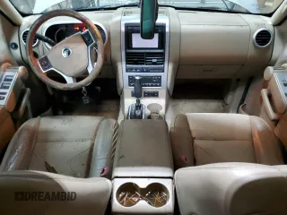 2007 Mercury Mountaineer Premier z VIN 4M2EU488X7UJ02978, wystawiony jako Copart lot #57634215 z przebiegiem 123 069 mil mil oraz Tytuł czysty. Historia ofert i sprzedaży dostępna na DreamBid. Obrazek 8.