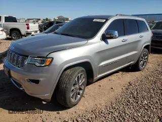 2018 Jeep Grand Cherokee Overland with VIN 1C4RJFCG8JC418368, listed as a Copart auction lot 50014005 with 34,287 mi miles and Salvage Title. Bid and sale history available at carsss.com. Image 1.