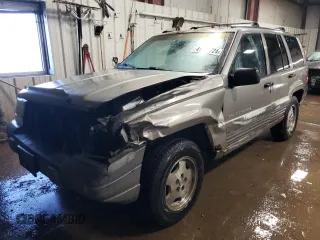 1997 Jeep Grand Cherokee Laredo with VIN 1J4GZ58Y7VC650813, listed as a Copart auction lot 41486724 with 266,004 mi miles and Salvage Title. Bid and sale history available at carsss.com. Image 1.
