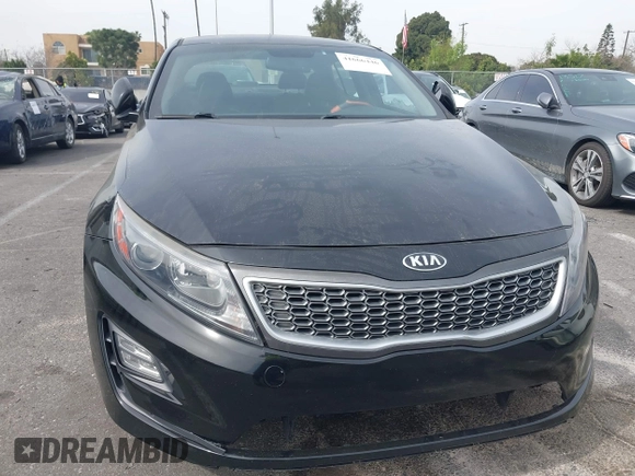 2015 Kia Optima Hybrid EX with VIN KNAGN4ADXF5080070, listed as a IAAI auction lot 41666446 with 119,845 mi miles. Bid and sale history available at carsss.com. Image 6.