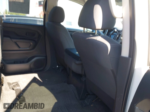 2023 Nissan Titan SV with VIN 1N6AA1EC1PN114674, listed as a IAAI auction lot 42141106 with 18,271 mi miles and . Bid and sale history available at DreamBid. Image 5.
