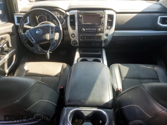 2017 Nissan Titan Pro-4X with VIN 1N6AA1E5XHN544948, listed as a Copart auction lot 61851175 with 216,797 mi miles and Clean title. Bid and sale history available at DreamBid. Image 8.
