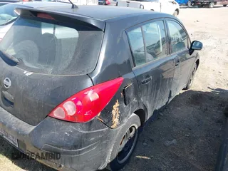 2009 Nissan Versa 1.8 SL with VIN 3N1BC13E19L497981, listed as a IAAI auction lot 41716561 with 176,722 mi miles. Bid and sale history available at carsss.com. Image 4.