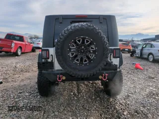 2007 Jeep Wrangler Rubicon z VIN 1J8GA64157L125319, wystawiony jako Copart lot #82929184 z przebiegiem 82 019 mil mil oraz Szkoda całkowita • Salvage title. Historia ofert i sprzedaży dostępna na DreamBid. Obrazek 6.