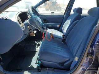 1994 Ford Taurus GL with VIN 1FALP5246RG126184, listed as a Copart auction lot 67615014 with 95,189 mi miles and Salvage Title. Bid and sale history available at carsss.com. Image 7.