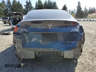 2020 Tesla Model Y Long Range with VIN 5YJYGDEEXLF017789, listed as a Copart auction lot 52705185 with 49,470 mi miles and Salvage Title. Bid and sale history available at DreamBid. Image 6.