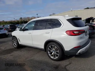 2020 BMW X5 xDrive40i with VIN 5UXCR6C04L9B36134, listed as a Copart auction lot 52220665 with 51,285 mi miles and Salvage title. Bid and sale history available at DreamBid. Image 2.