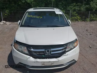 2014 Honda Odyssey EX-L with VIN 5FNRL5H63EB131596, listed as a IAAI auction lot 42402427 with 106,156 mi miles and . Bid and sale history available at DreamBid. Image 6.