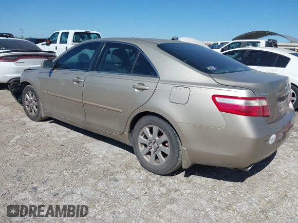 2009 Toyota Camry LE with VIN 4T1BK46K09U075169, listed as a IAAI auction lot 39169852 with 211,105 mi miles. Bid and sale history available at carsss.com. Image 3.
