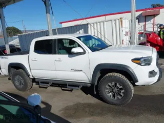 2021 Toyota Tacoma 2WD SR5 with VIN 3TMAZ5CN7MM144212, listed as a IAAI auction lot 41286049 with 75,113 mi miles. Bid and sale history available at carsss.com. Image 13.