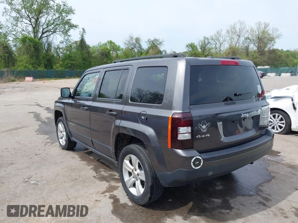2014 Jeep Patriot Latitude with VIN 1C4NJRFB3ED847997, listed as a IAAI auction lot 42109140 with 121,299 mi miles and . Bid and sale history available at carsss.com. Image 3.