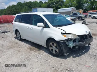 2015 Toyota Sienna LE AAS with VIN 5TDKK3DCXFS571588, listed as a IAAI auction lot 42450773 with 143,397 mi miles and . Bid and sale history available at DreamBid. Image 1.