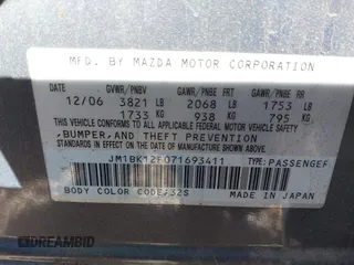 2007 Mazda 3 i Touring z VIN JM1BK12F071693411, wystawiony jako IAAI lot #41819395 z przebiegiem 162 693 mil mil oraz . Historia ofert i sprzedaży dostępna na DreamBid. Obrazek 9.