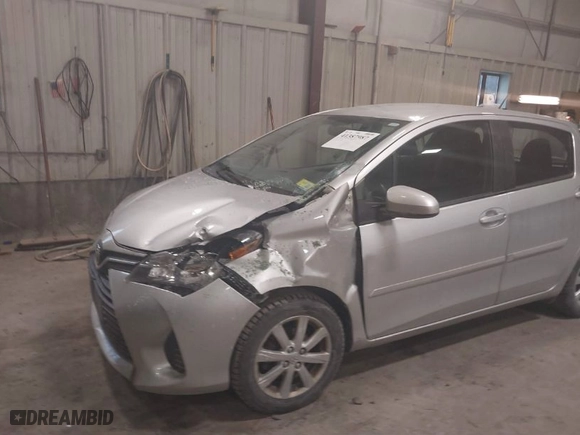 2016 Toyota Yaris L with VIN VNKKTUD32GA066699, listed as a IAAI auction lot 41387987 with 76,595 mi miles. Bid and sale history available at carsss.com. Image 6.
