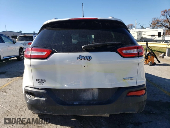 2016 Jeep Cherokee Altitude with VIN 1C4PJLCB7GW135235, listed as a Copart auction lot 80892474 with 201,458 mi miles and Salvage Title. Bid and sale history available at carsss.com. Image 6.