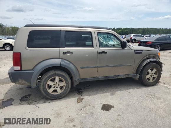2007 Dodge Nitro SXT z VIN 1D8GT28KX7W596489, wystawiony jako Copart lot #56151355 z przebiegiem 295 949 mil mil oraz Szkoda całkowita • Salvage title. Historia ofert i sprzedaży dostępna na DreamBid. Obrazek 3.