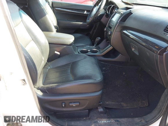 2013 Kia Sorento SX with VIN 5XYKW4A21DG360070, listed as a IAAI auction lot 42120968 with 196,932 mi miles. Bid and sale history available at carsss.com. Image 5.