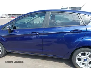 2016 Ford Fiesta SE with VIN 3FADP4EJ4GM199945, listed as a IAAI auction lot 41881260 with 98,945 mi miles. Bid and sale history available at carsss.com. Image 14.