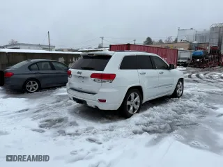2014 Jeep Grand Cherokee Overland with VIN 1C4RJFCM1EC298621, listed as a Copart auction lot 50373995 with 142,491 mi miles and Clean Title. Bid and sale history available at carsss.com. Image 4.