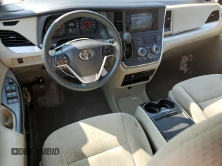 2016 Toyota Sienna LE with VIN 5TDJK3DC2GS133323, listed as a Copart auction lot 70515664 with 106,750 mi miles and Salvage Title. Bid and sale history available at carsss.com. Image 8.