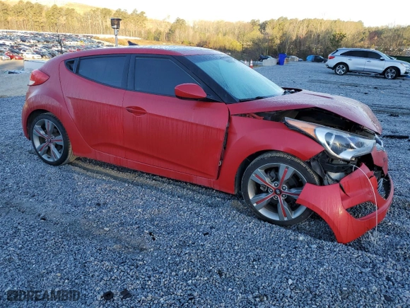 2012 Hyundai Veloster w/Black Int with VIN KMHTC6AD3CU071629, listed as a Copart auction lot 50325325 with 64,351 mi miles and Salvage Title. Bid and sale history available at carsss.com. Image 4.