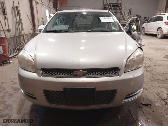 2014 Chevrolet Impala Limited LS with VIN 2G1WA5E36E1133664, listed as a IAAI auction lot 41409054 with NaN miles. Bid and sale history available at carsss.com. Image 12.