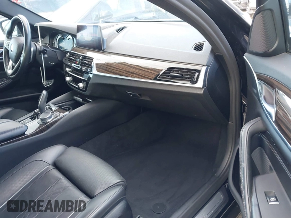 2019 BMW 5 Series 530i with VIN WBAJA5C54KWW45379, listed as a IAAI auction lot 41276092 with 77,025 mi miles. Bid and sale history available at carsss.com. Image 5.